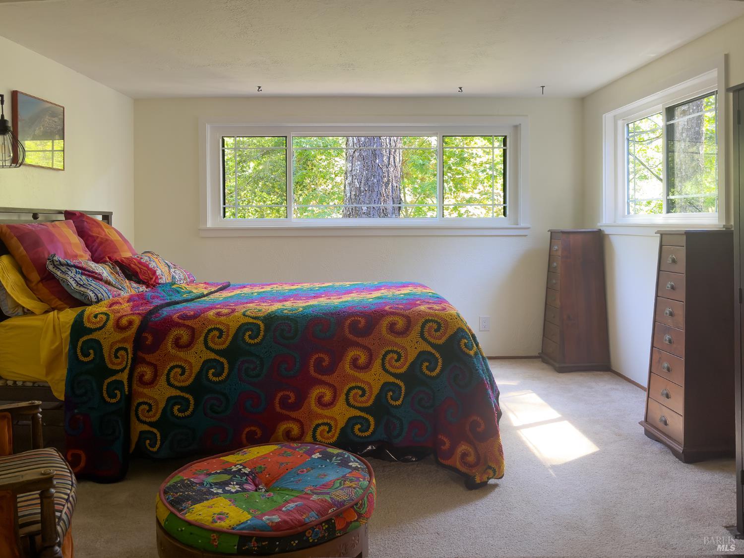 5845 Austin Creek Road Cazadero, CA 95421 - Photo 16 of 26 a bedroom with a bed and a window
