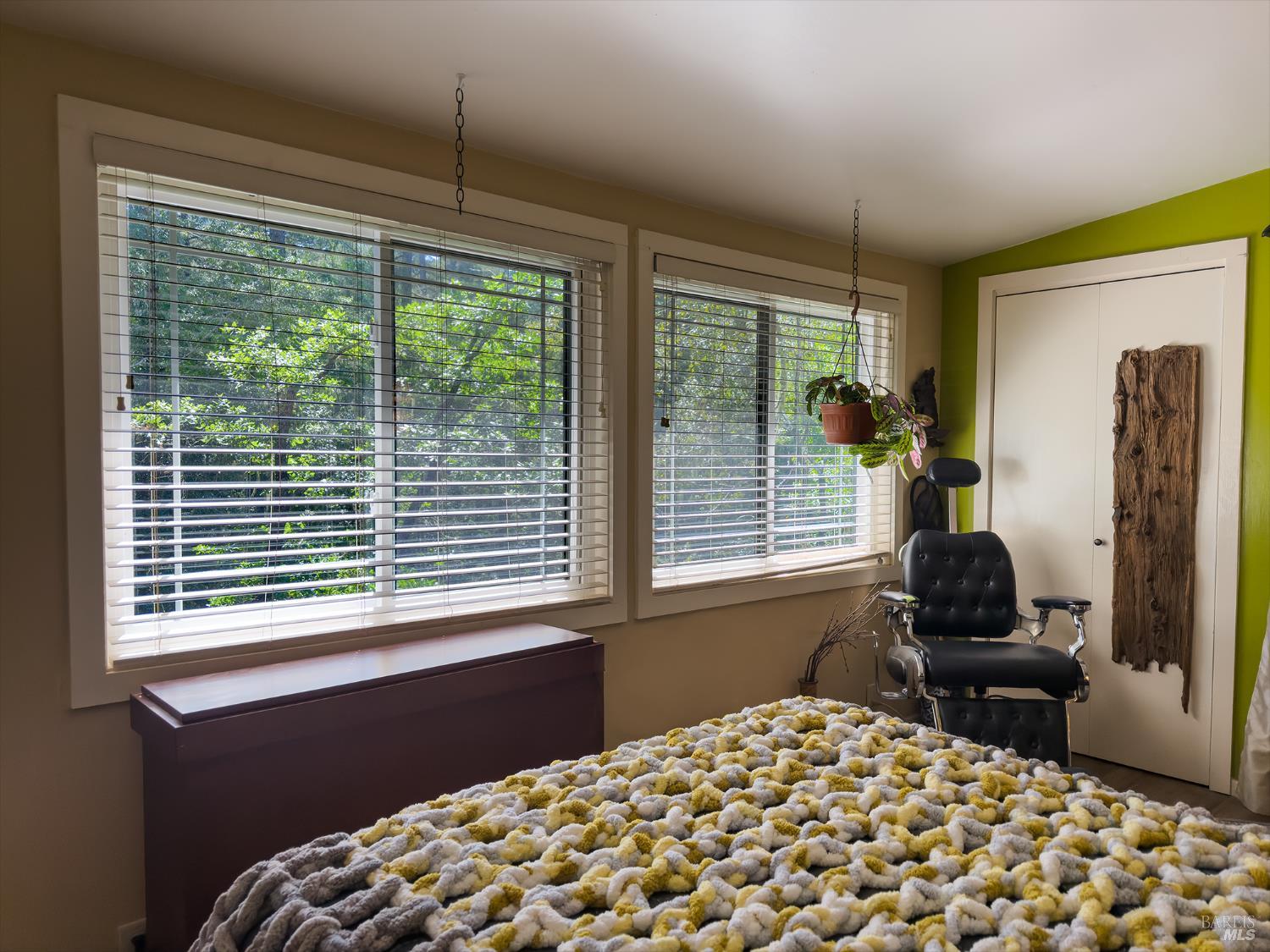 5845 Austin Creek Road Cazadero, CA 95421 - Photo 19 of 26 a bedroom with a bed and two windows