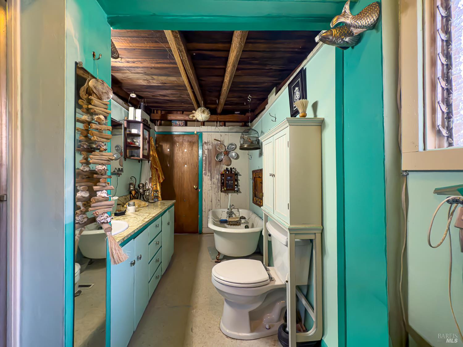 5845 Austin Creek Road Cazadero, CA 95421 - Photo 20 of 26 a bathroom with a toilet a sink and a shower
