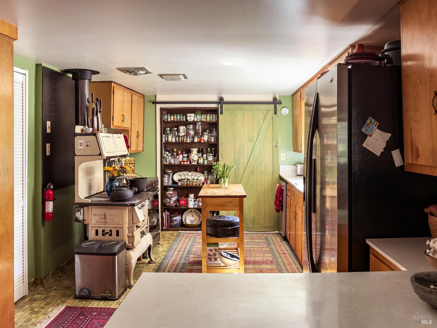 5845 Austin Creek Road Cazadero, CA 95421 - Photo 4 of 26 a room with furniture and a window