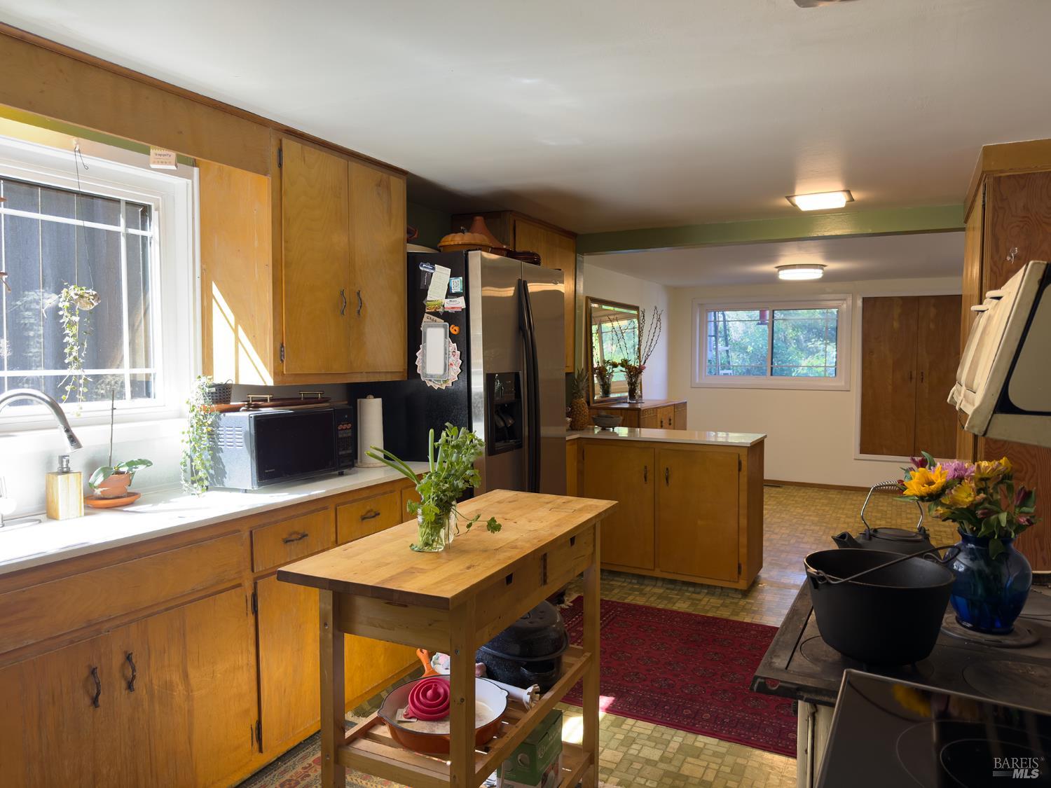 5845 Austin Creek Road Cazadero, CA 95421 - Photo 5 of 26 a view of a dining room with furniture and window
