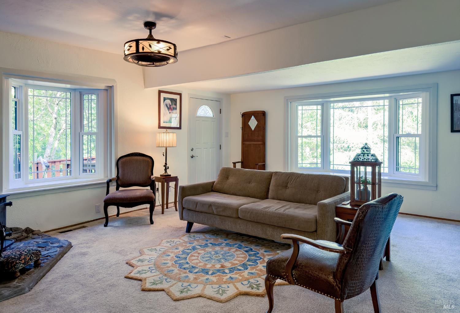 5845 Austin Creek Road Cazadero, CA 95421 - Photo 9 of 26 a living room with furniture and a window