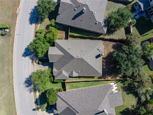 a view of a house with outdoor space and sitting area