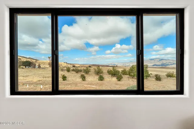 a view of swimming pool with outdoor seating and wooden floor