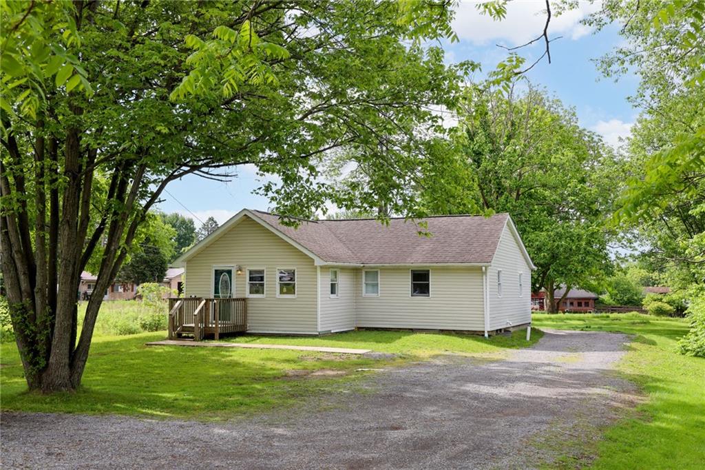 343 Whitestown Road Butler, PA 16001 - Photo 2 of 30 a view of a yard in front of a house with a large tree