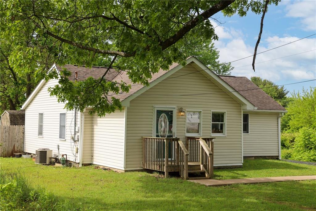 343 Whitestown Road Butler, PA 16001 - Photo 3 of 30 a view of a backyard with table and chairs and potted plants