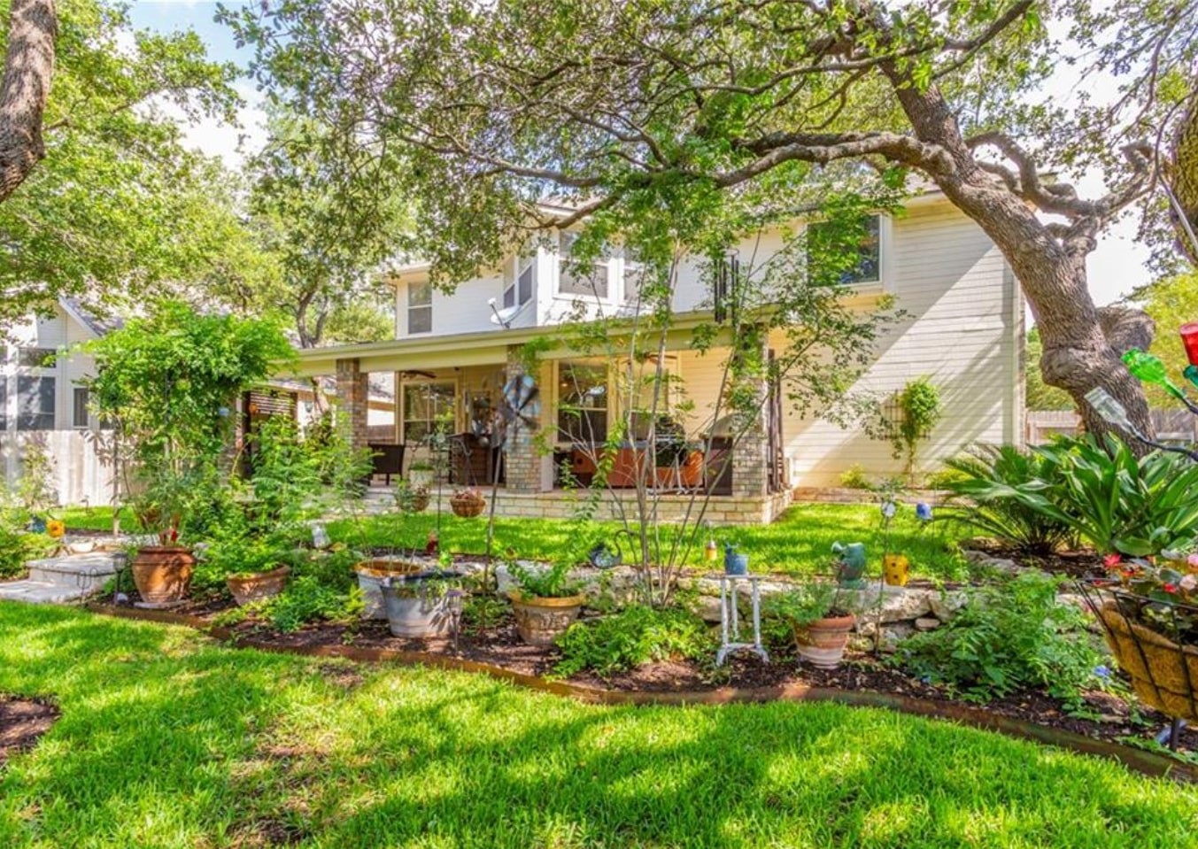 1100 Antelope Ridge Cedar Park, TX 78613 - Photo 24 of 24 a view of a house with a garden