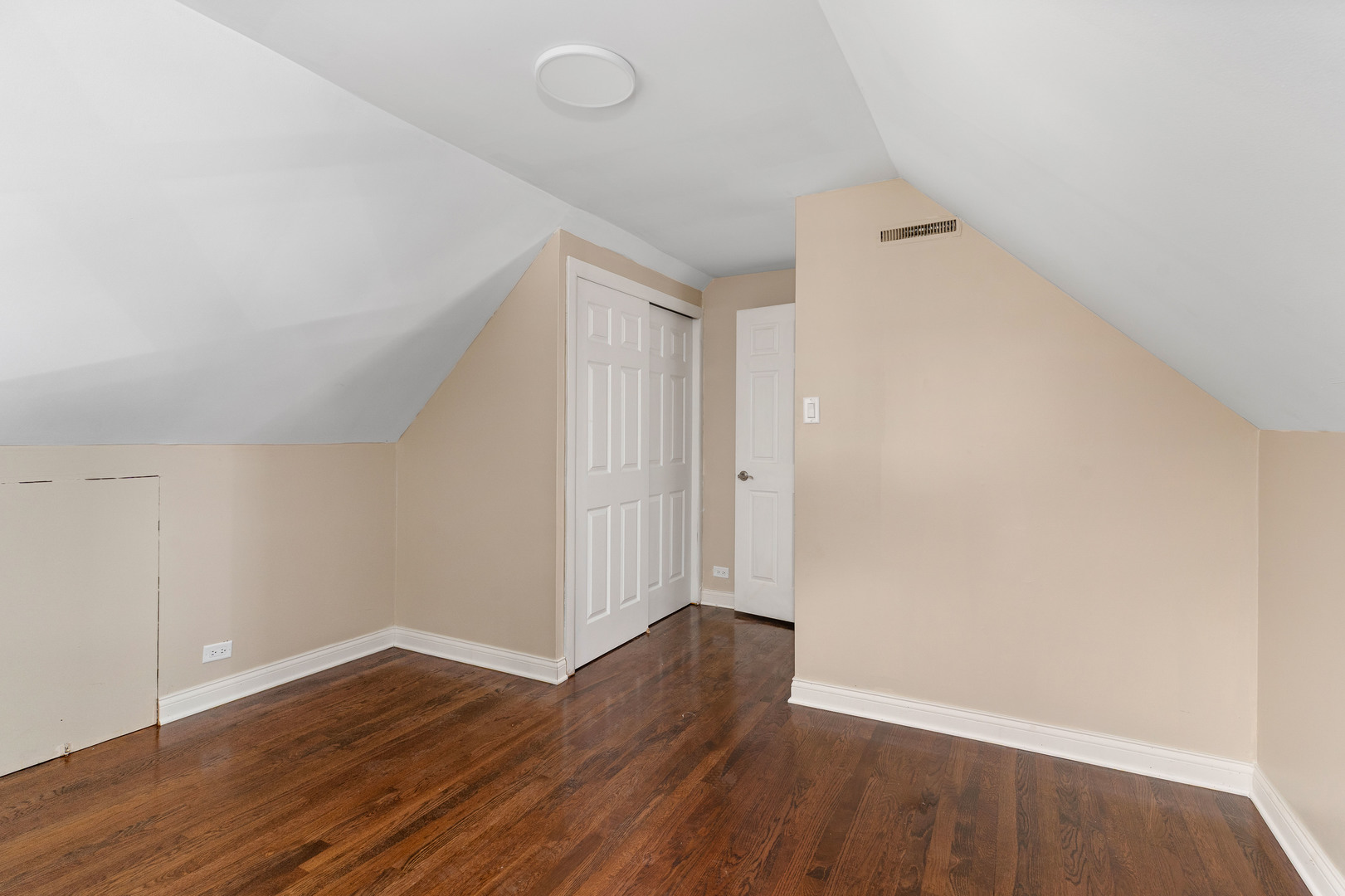 5345 North Neva Avenue Chicago, IL 60656 - Photo 21 of 32 a view of an empty room with wooden floor