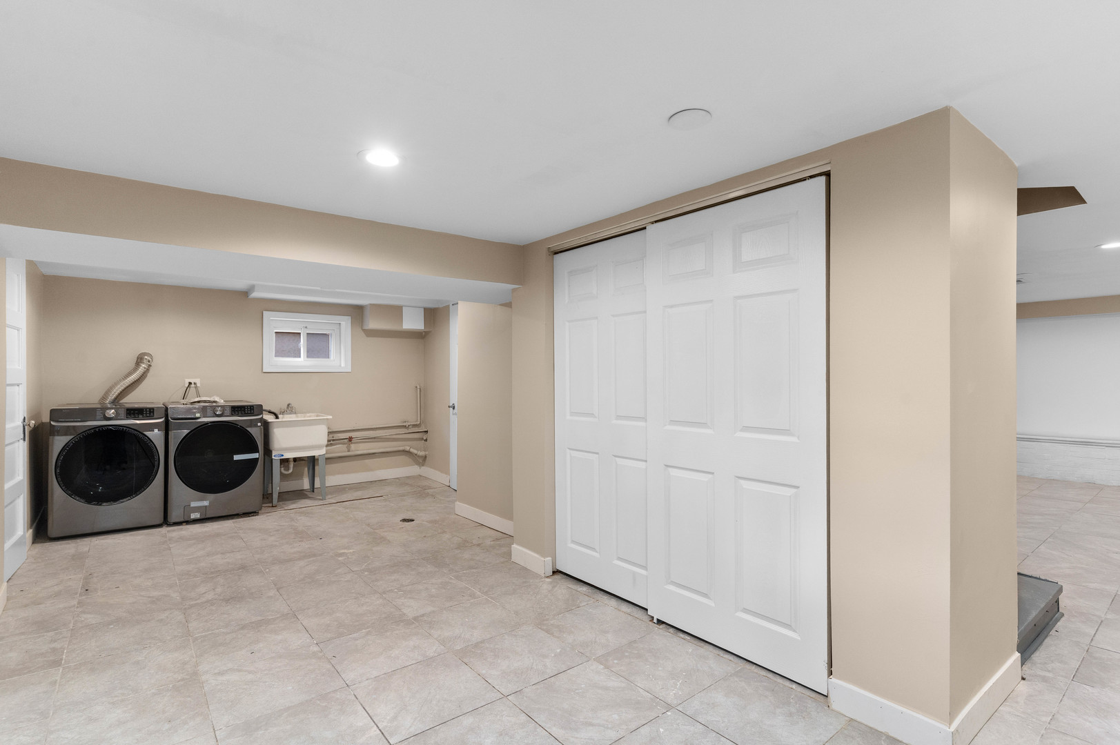 5345 North Neva Avenue Chicago, IL 60656 - Photo 25 of 32 a view of a storage & utility room with two washing machine
