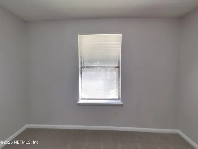 a view of a small space with window