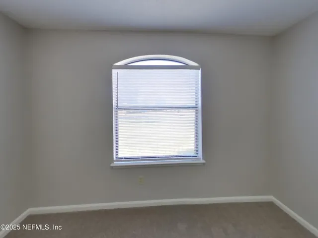 a view of a small space with a window