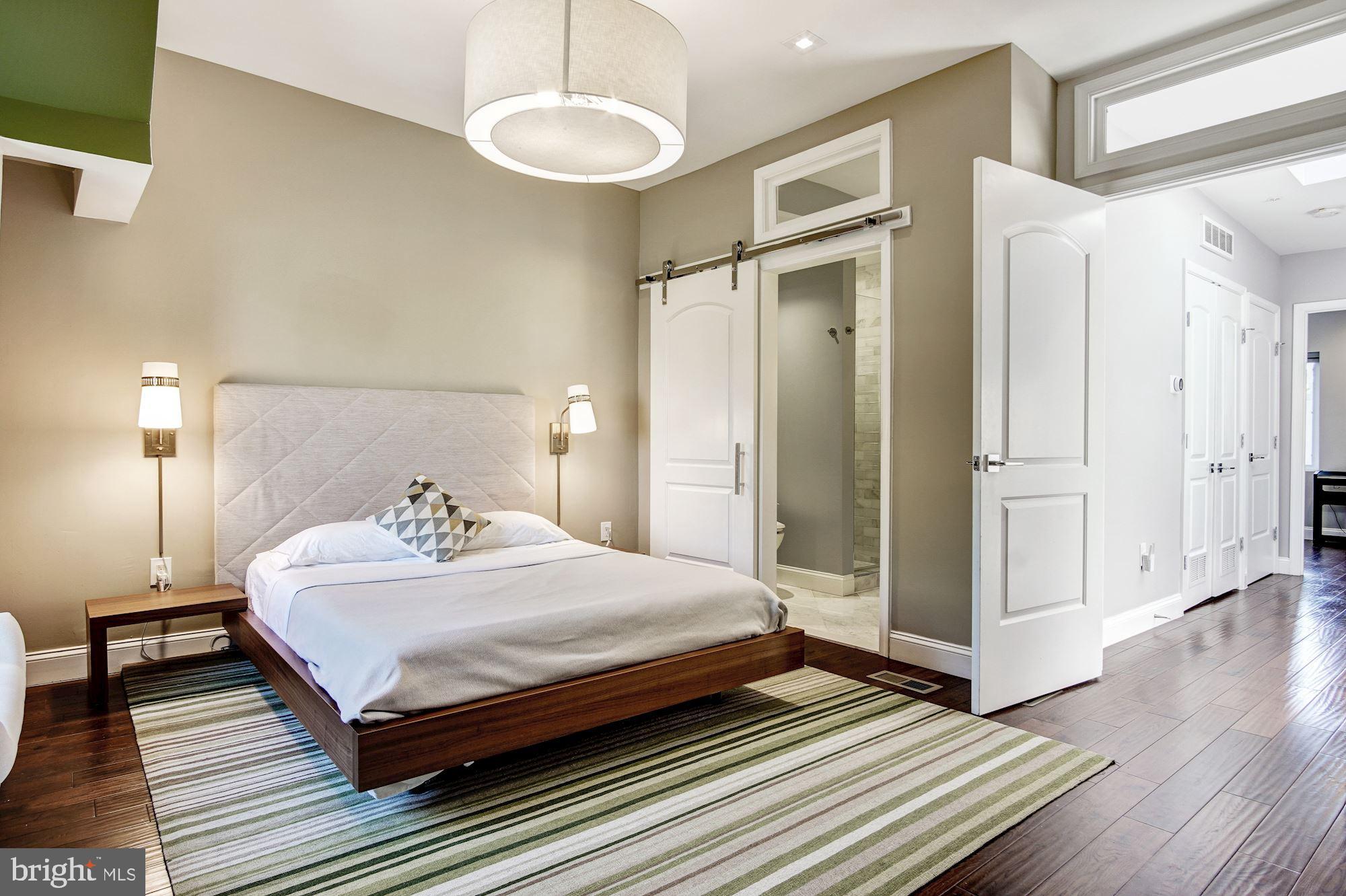 1823 D Street Northeast, Unit C Washington, DC 20002 - Photo 18 of 31 Owner's Suite with barn door to Master Bath