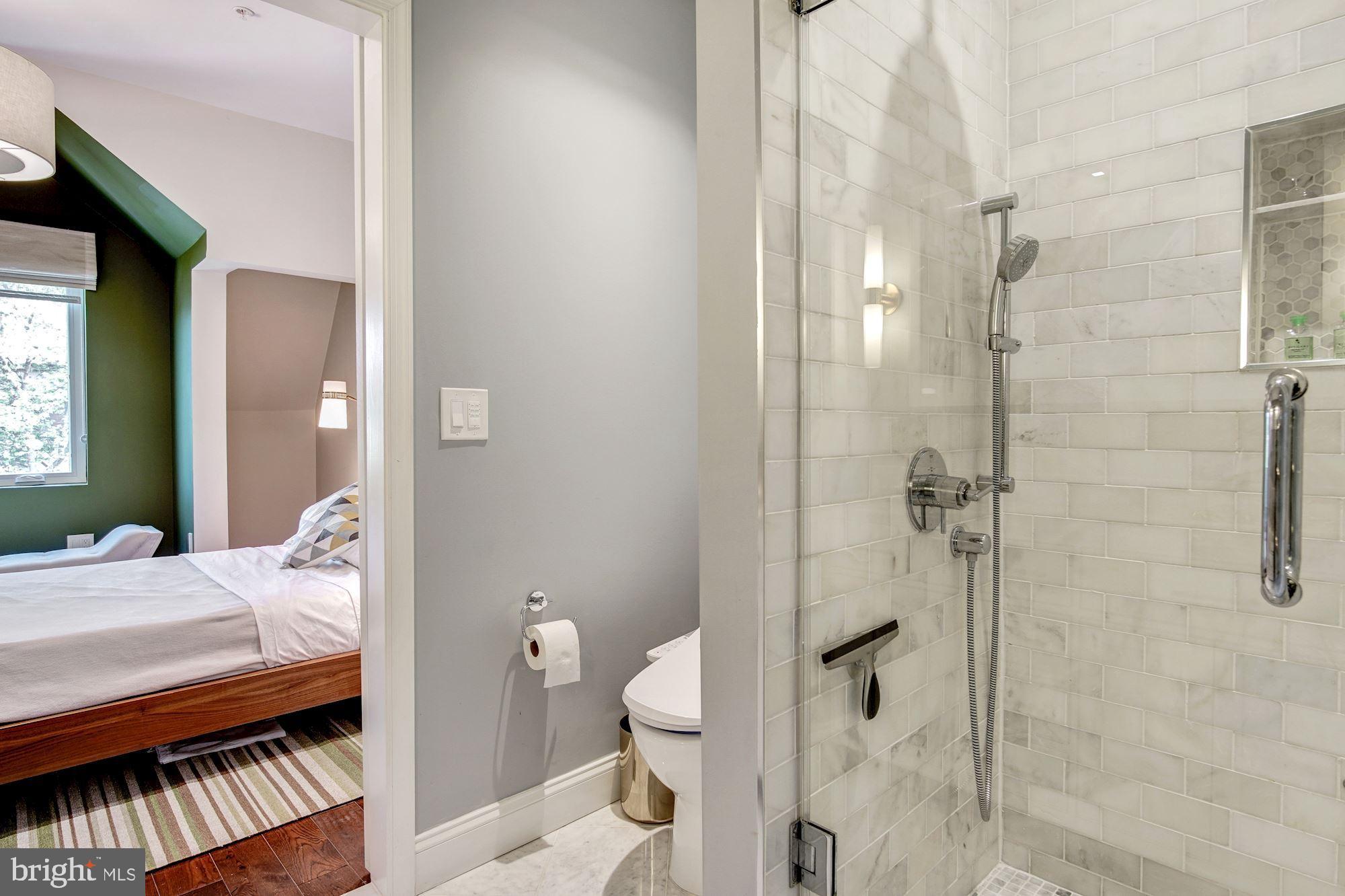 1823 D Street Northeast, Unit C Washington, DC 20002 - Photo 20 of 31 Carrara marble shower with Grohe fixtures