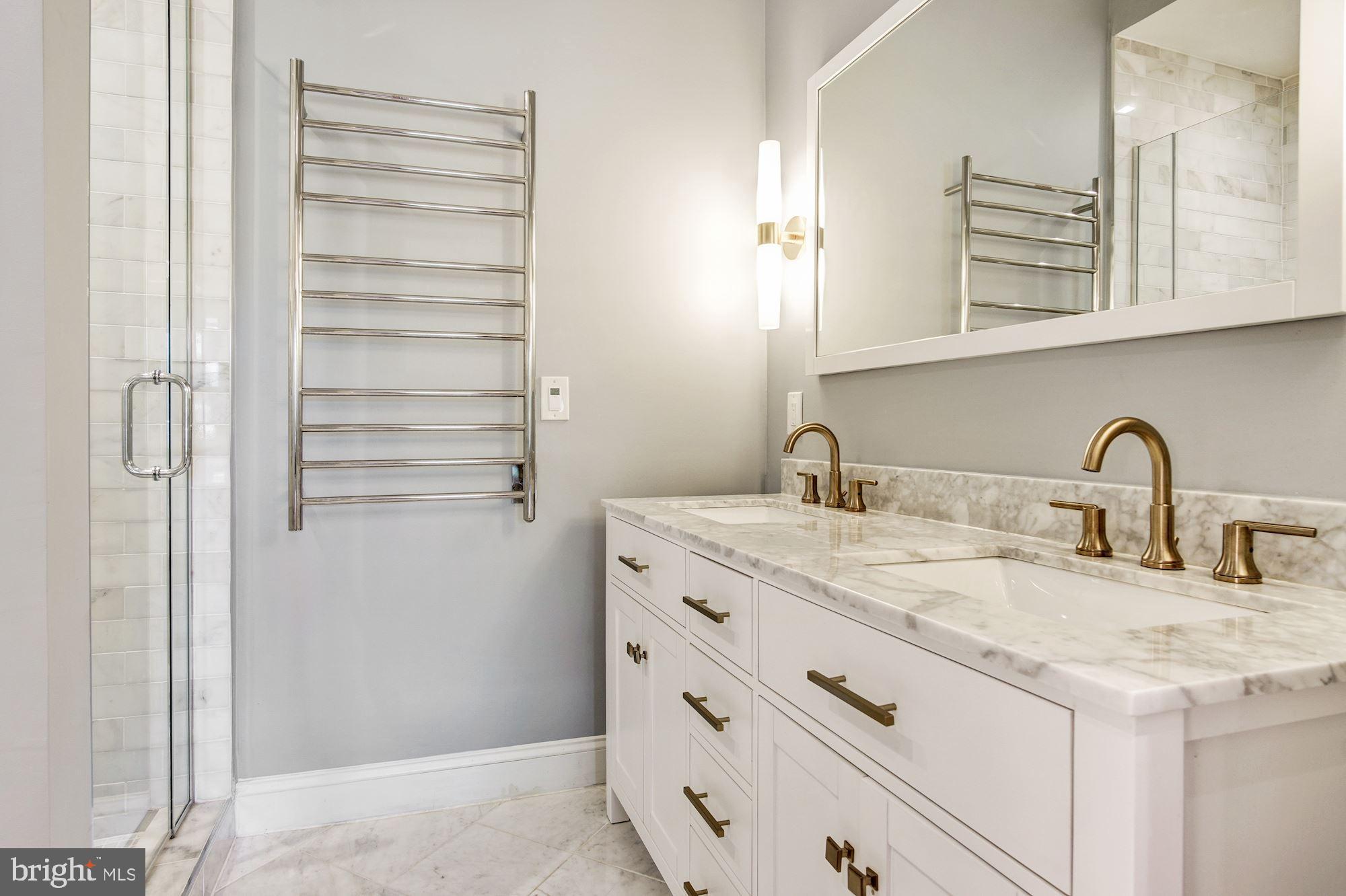 1823 D Street Northeast, Unit C Washington, DC 20002 - Photo 21 of 31 Dual Vanity with Delta Trinsic champagne faucets