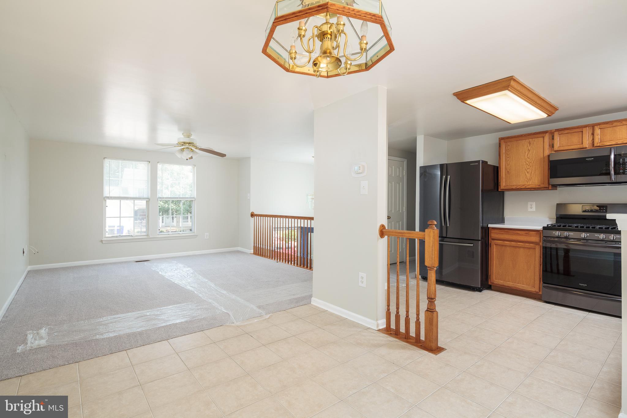 1010 Mariner Road Joppa, MD 21085 - Photo 10 of 36 Living, Dining Rooms & Kitchen
