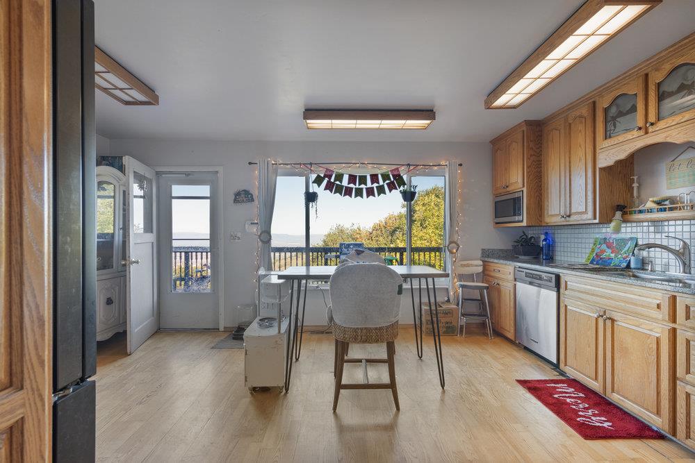 380 Hillside Road San Juan Bautista, CA 95045 - Photo 18 of 60 a living room with furniture and a large window