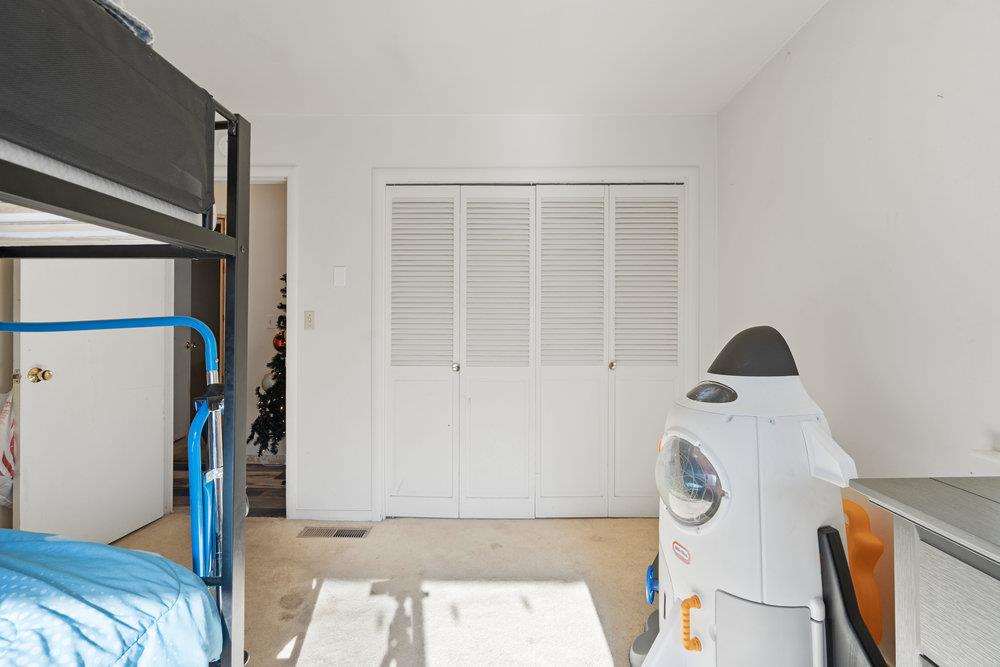 380 Hillside Road San Juan Bautista, CA 95045 - Photo 30 of 60 a bedroom with a bed and a rug