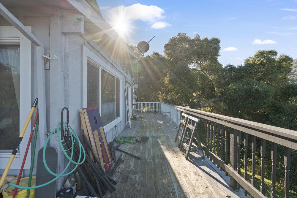 380 Hillside Road San Juan Bautista, CA 95045 - Photo 52 of 60 a view of balcony with wooden floor and fence