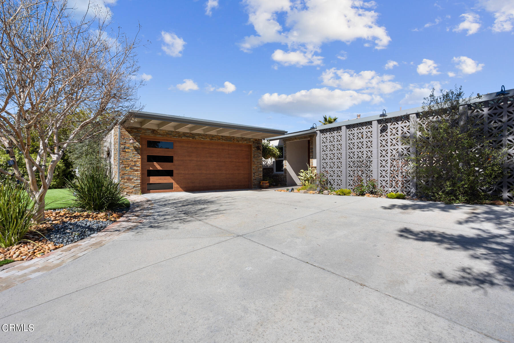 9400 Crystal View Drive Tujunga, CA 91042 - Photo 11 of 67 a view of a house with a yard and garage
