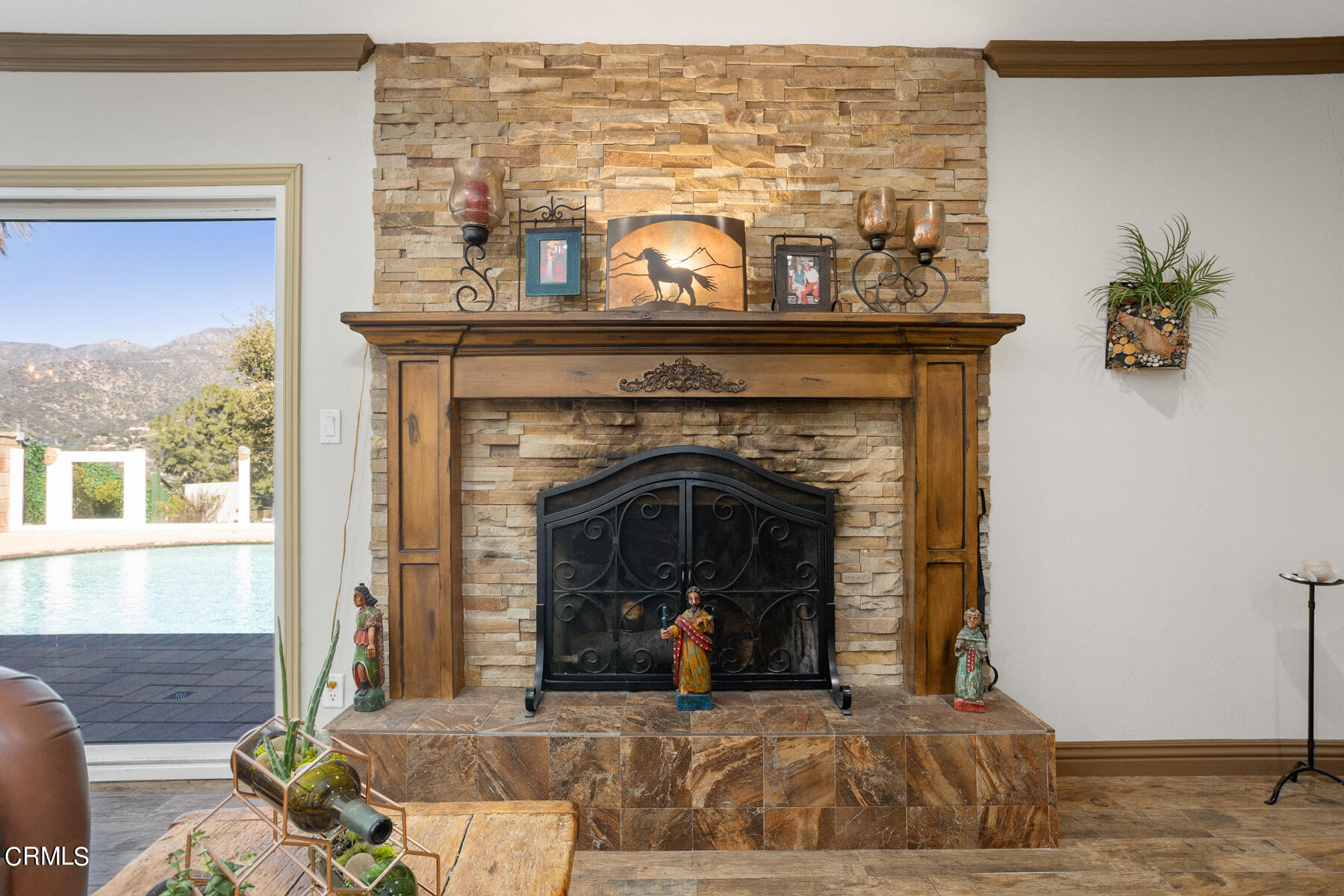 9400 Crystal View Drive Tujunga, CA 91042 - Photo 19 of 67 a living room with furniture and a fireplace