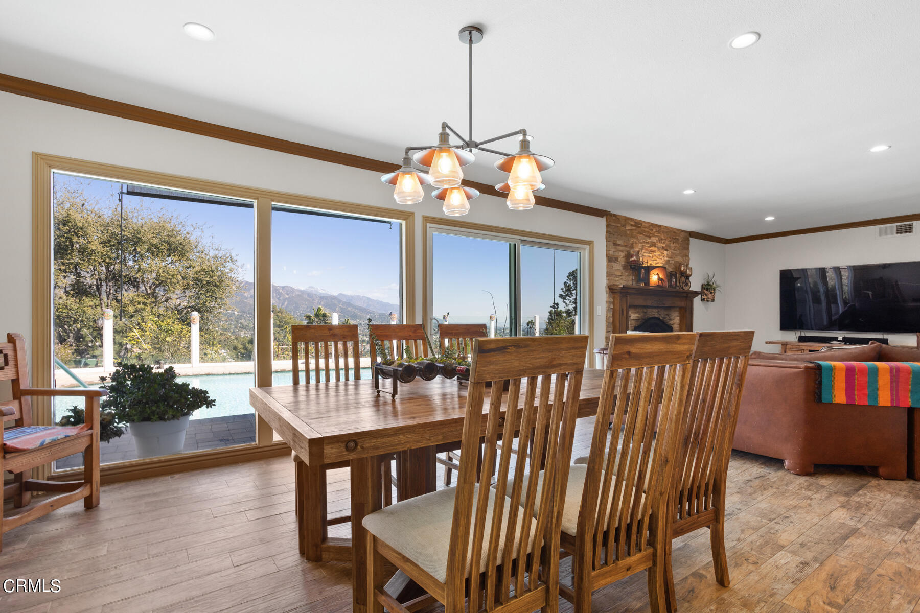 9400 Crystal View Drive Tujunga, CA 91042 - Photo 20 of 67 a view of a dining room with furniture window and wooden floor