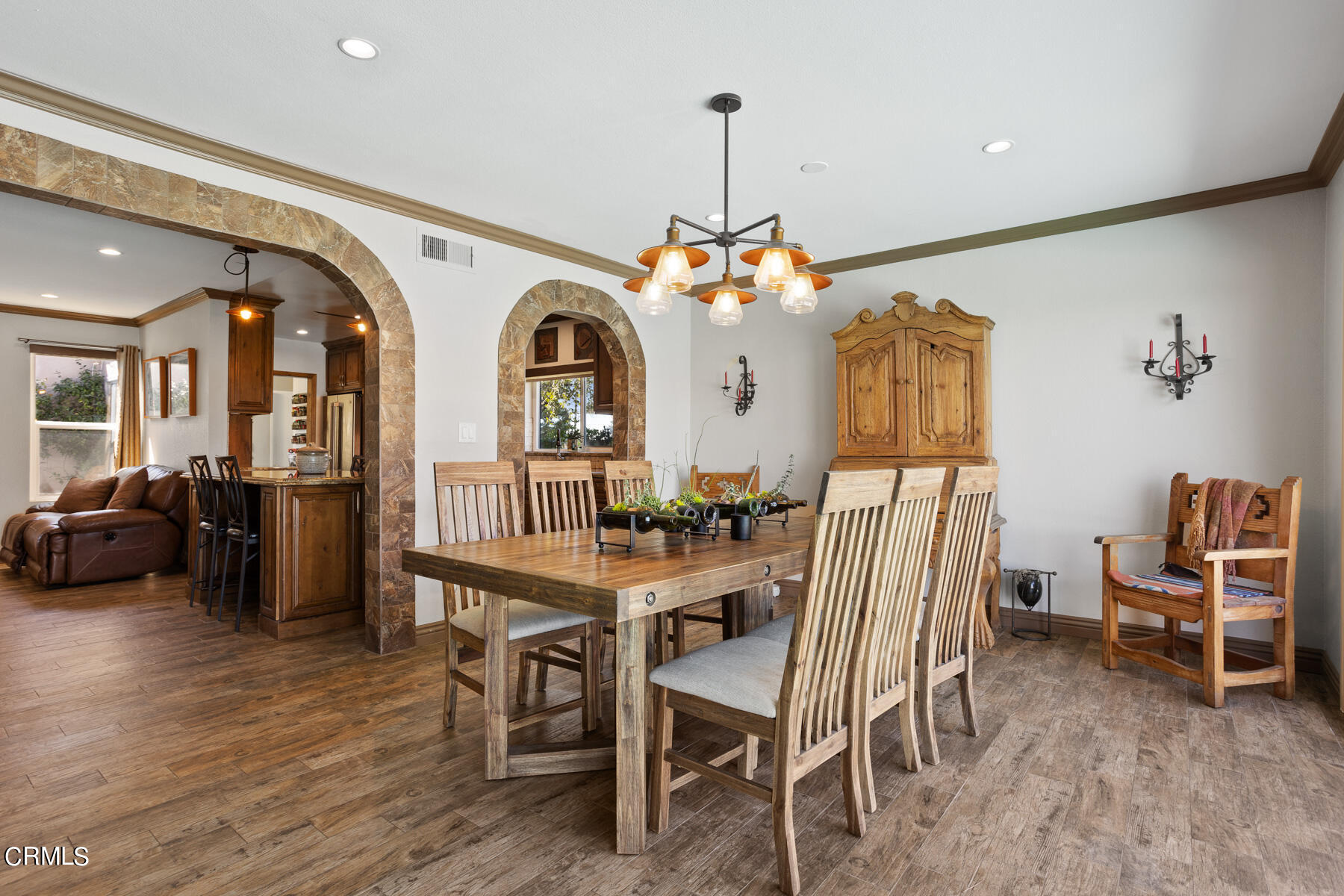 9400 Crystal View Drive Tujunga, CA 91042 - Photo 23 of 67 a view of a dining room with furniture and wooden floor