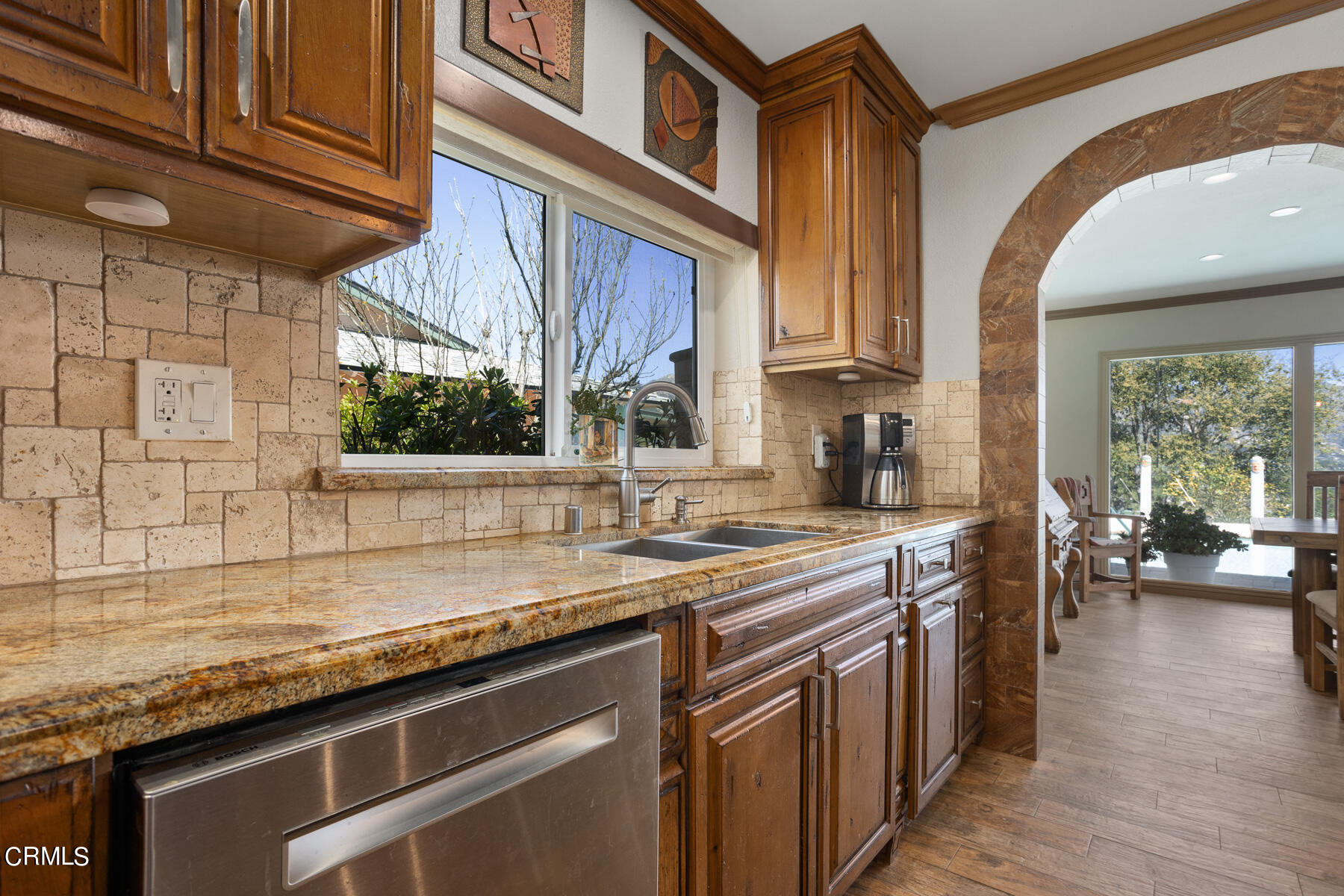 9400 Crystal View Drive Tujunga, CA 91042 - Photo 30 of 67 a kitchen with a sink and a wooden cabinets