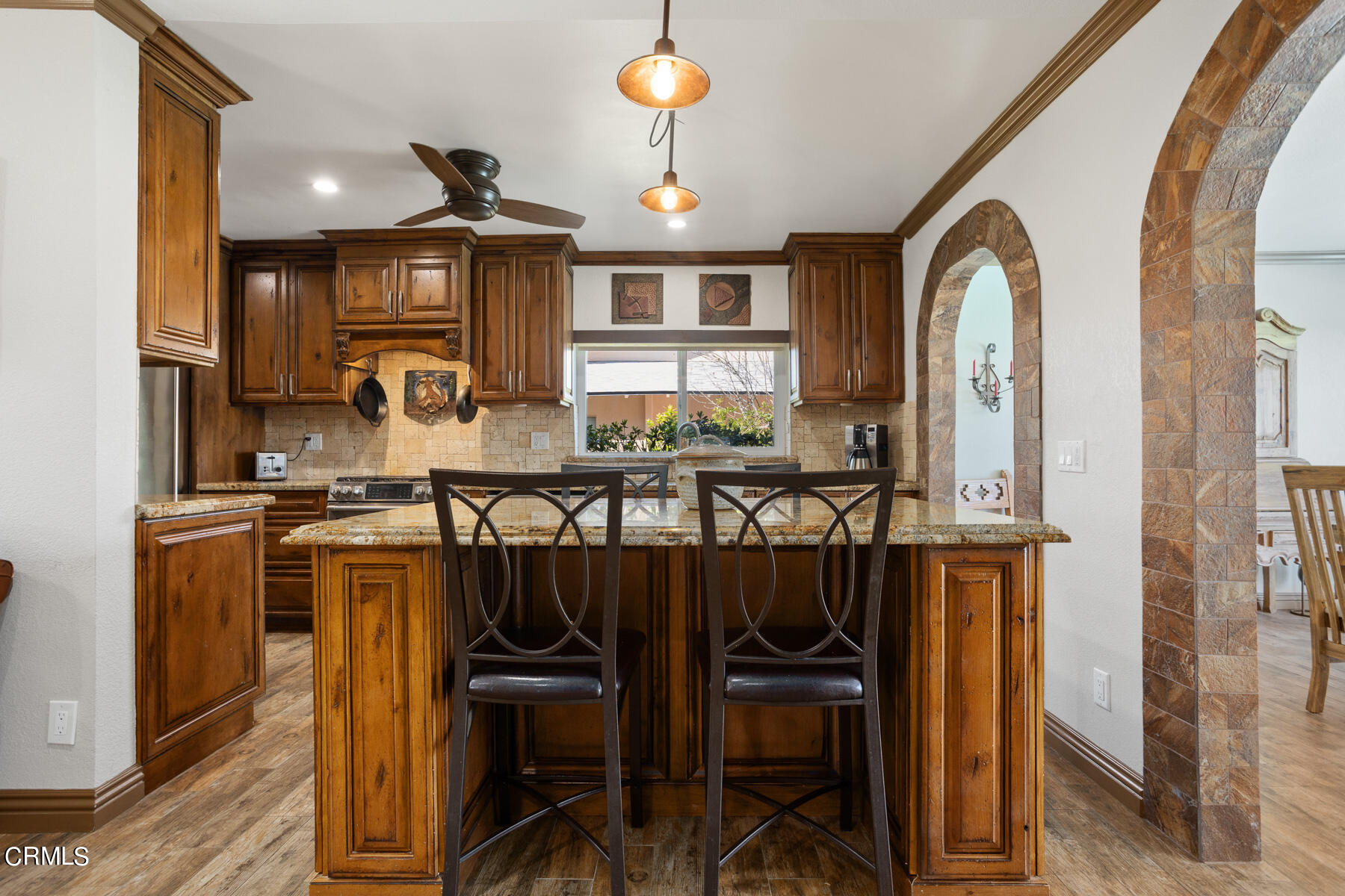 9400 Crystal View Drive Tujunga, CA 91042 - Photo 32 of 67 a view of a kitchen with stainless steel appliances granite countertop a stove and a refrigerator