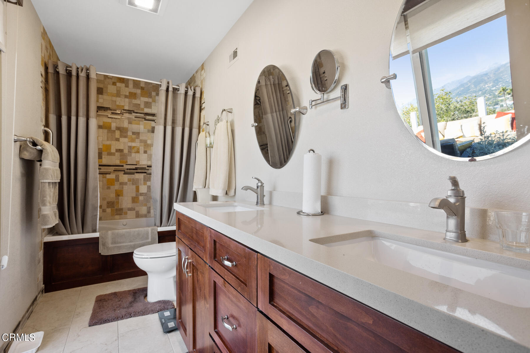 9400 Crystal View Drive Tujunga, CA 91042 - Photo 45 of 67 a bathroom with a double vanity sink and a mirror