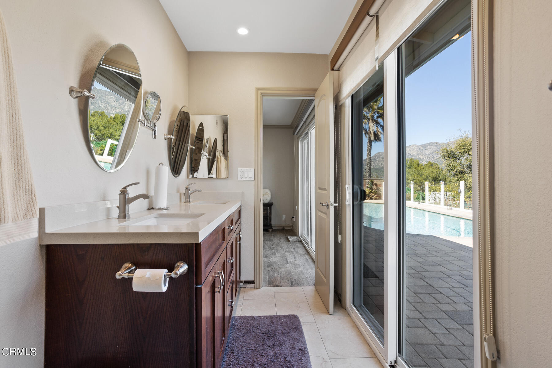 9400 Crystal View Drive Tujunga, CA 91042 - Photo 46 of 67 a bathroom with a sink a mirror and a toilet