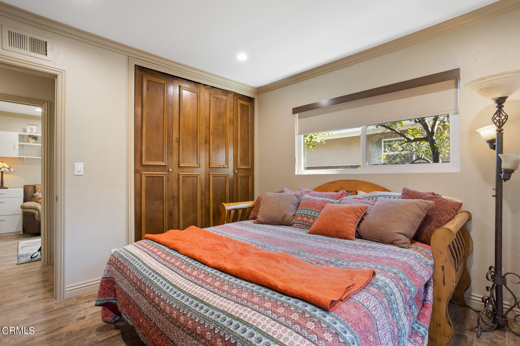 9400 Crystal View Drive Tujunga, CA 91042 - Photo 49 of 67 a bedroom with a bed and a painting on the wall