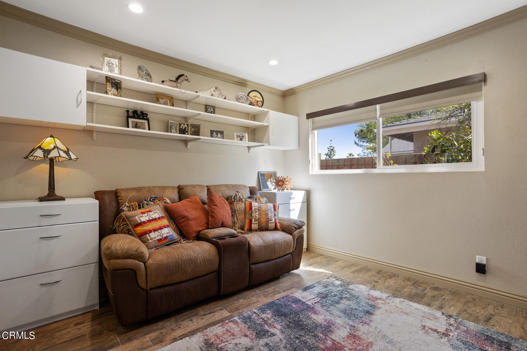 9400 Crystal View Drive Tujunga, CA 91042 - Photo 54 of 67 a living room with furniture and cabinets