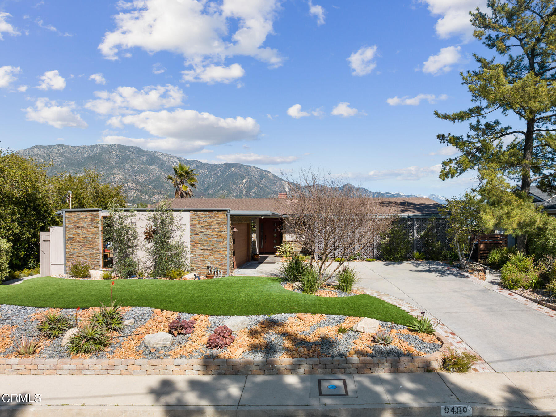 9400 Crystal View Drive Tujunga, CA 91042 - Photo 8 of 67 a view of a garden with a pathway