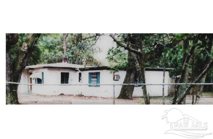 a black and white photo of a house