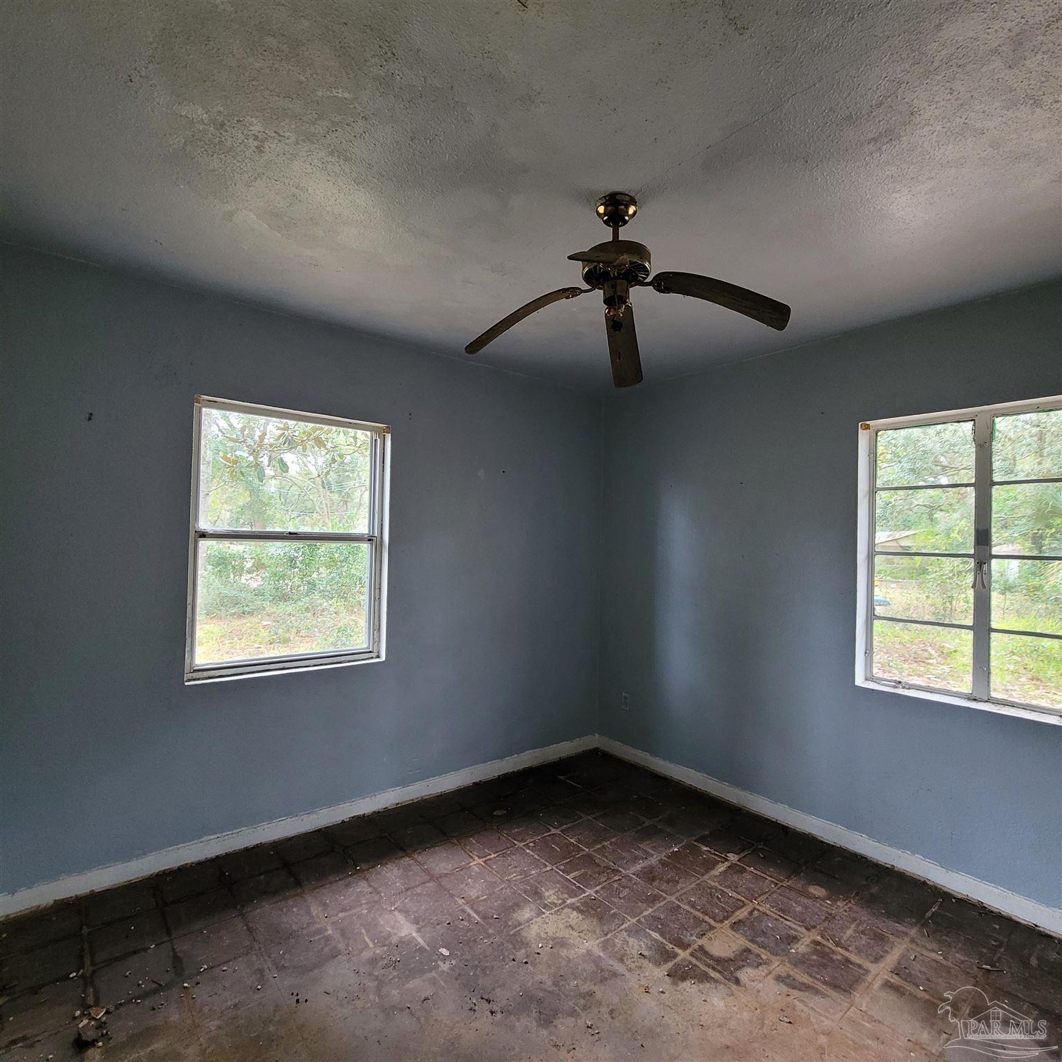 635 Edgewater Drive Pensacola, FL 32507 - Photo 6 of 9 a view of an empty room and window