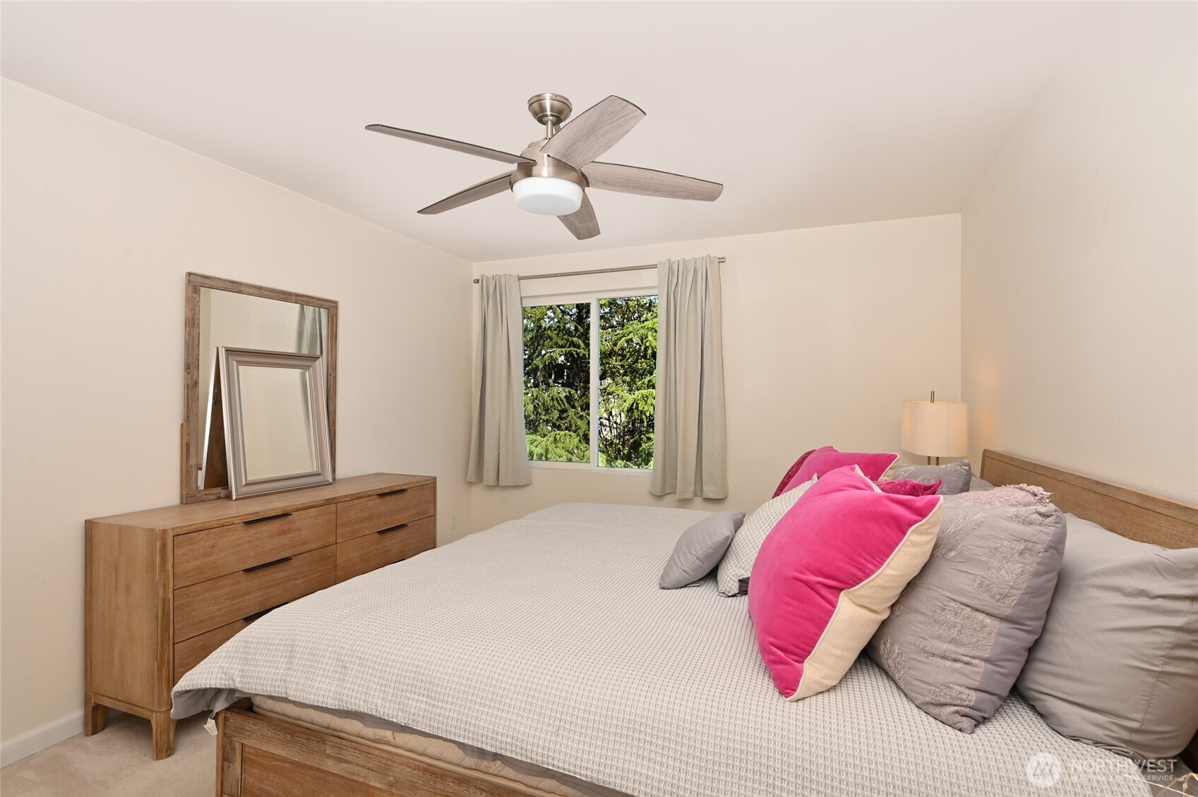 7021 Sand Point Way Northeast, Unit B319 Seattle, WA 98115 - Photo 11 of 29 a bedroom with a bed and window