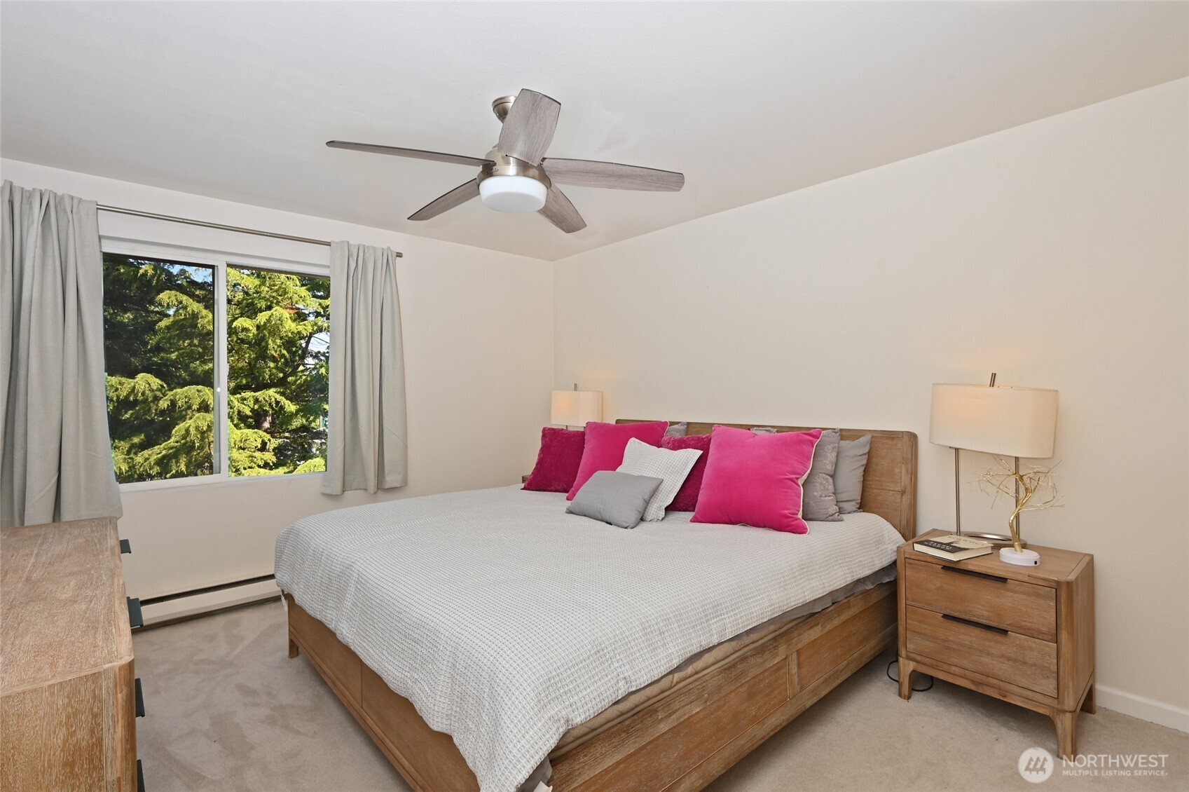 7021 Sand Point Way Northeast, Unit B319 Seattle, WA 98115 - Photo 12 of 29 a bedroom with a bed and window