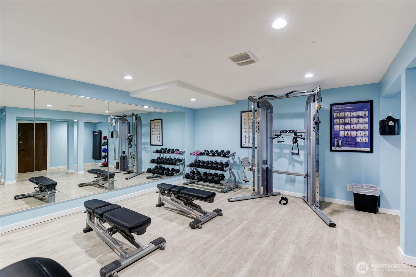 7021 Sand Point Way Northeast, Unit B319 Seattle, WA 98115 - Photo 22 of 29 a living room with furniture gym equipment and a view of living room