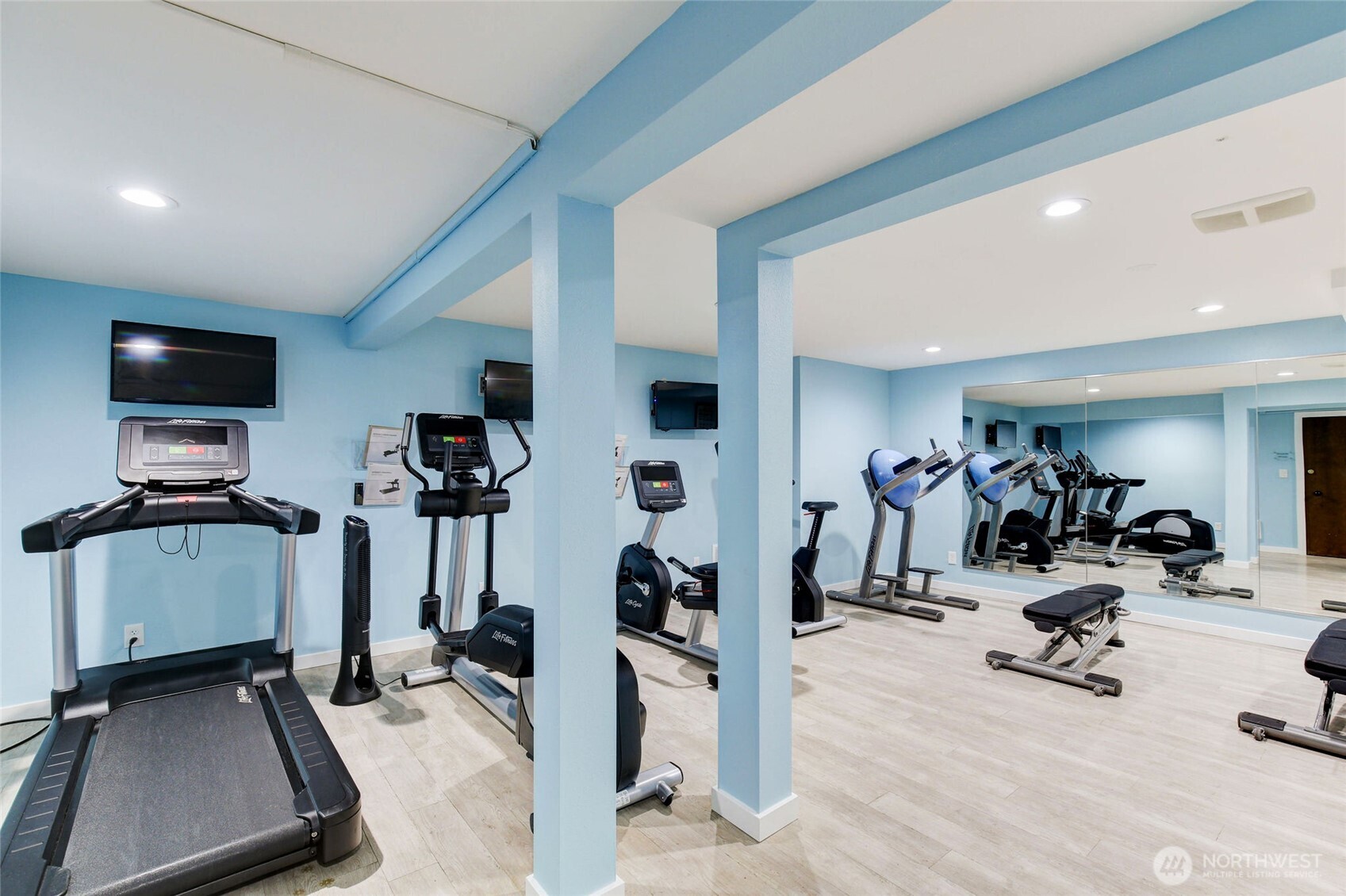 7021 Sand Point Way Northeast, Unit B319 Seattle, WA 98115 - Photo 23 of 29 a view of a room with gym equipment