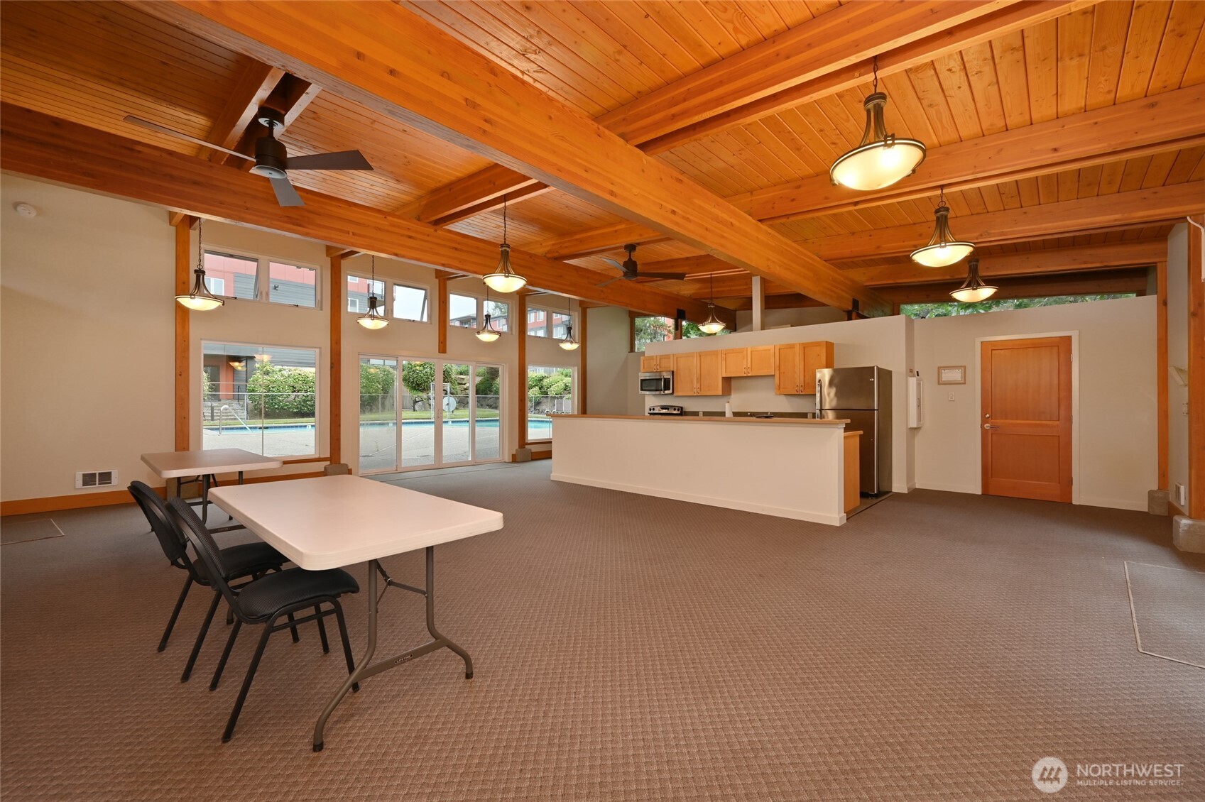 7021 Sand Point Way Northeast, Unit B319 Seattle, WA 98115 - Photo 26 of 29 a view of a kitchen with furniture and a window