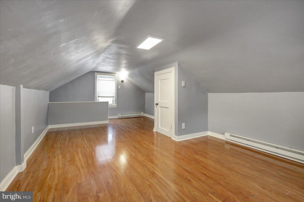 5145 Spruce Road Emmaus, PA 18049 - Photo 16 of 26 a view of empty room with wooden floor