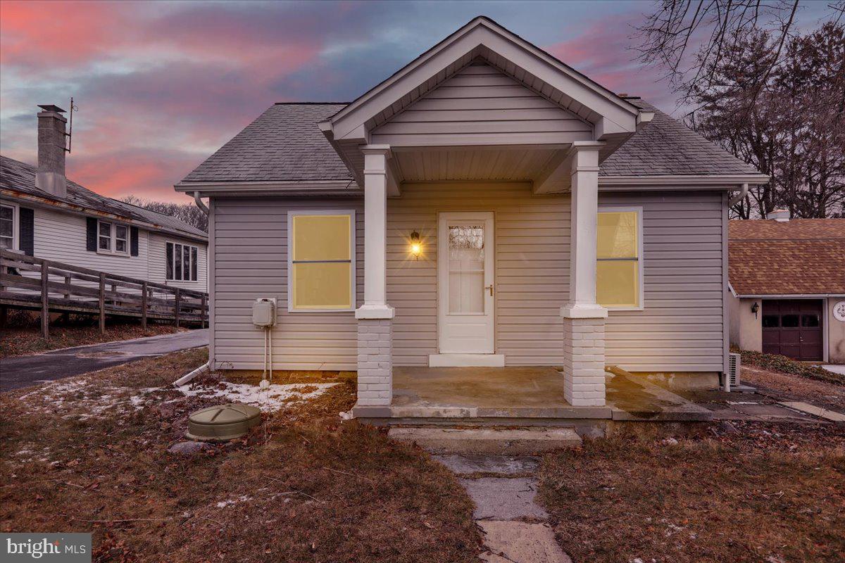 5145 Spruce Road Emmaus, PA 18049 - Photo 20 of 26 a front view of a house with yard