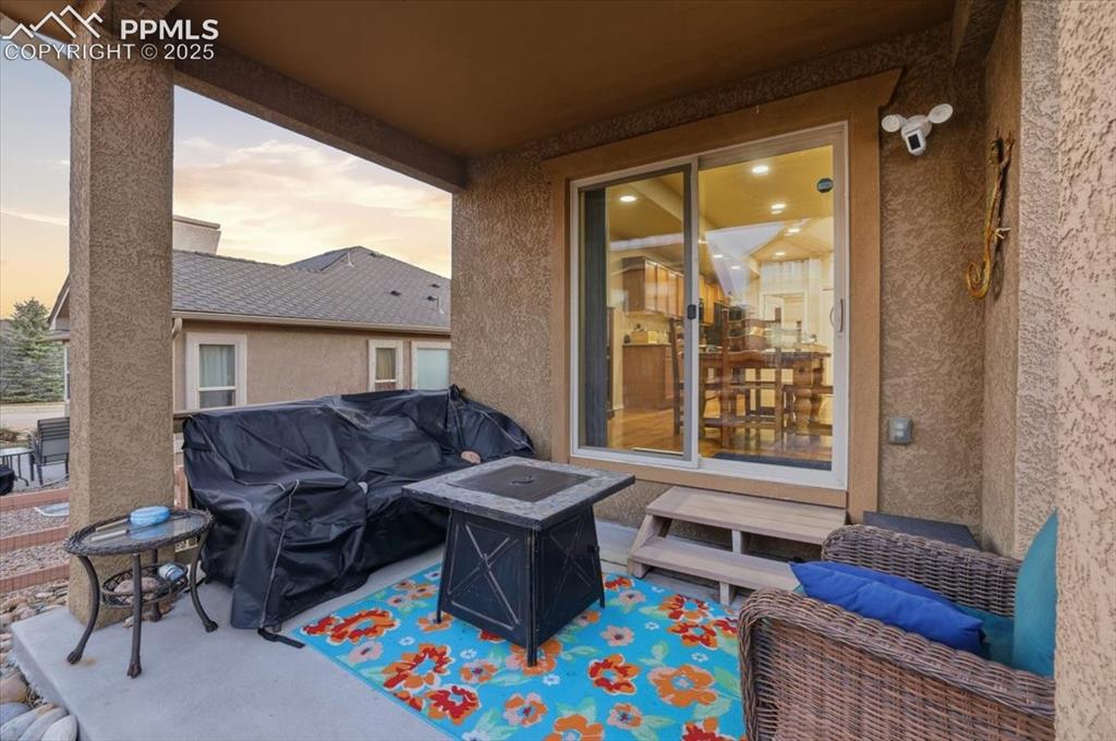 2374 Cinnabar Road Colorado Springs, CO 80921 - Photo 13 of 47 The covered patio is the perfect spot to unwind at the end of the day.