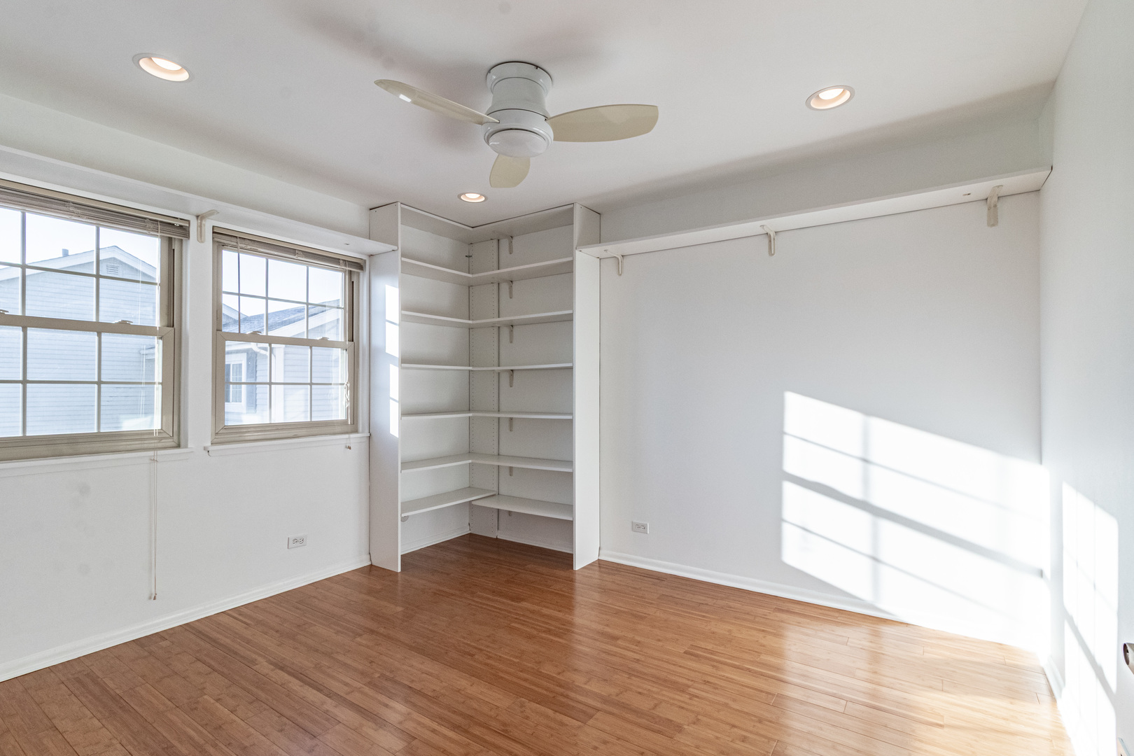 640 Sanders Court Gurnee, IL 60031 - Photo 19 of 38 wooden floor in an empty room with a window