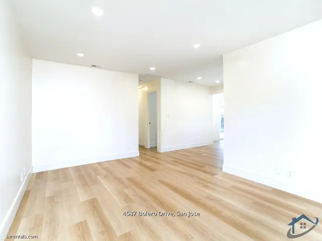 a view of a big room with wooden floor
