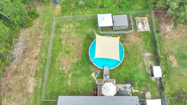 a picture of a table and chairs in the patio
