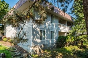 401 North Spokane Avenue Newport, WA 99156 - Photo 2 of 8 a view of a house with a tree