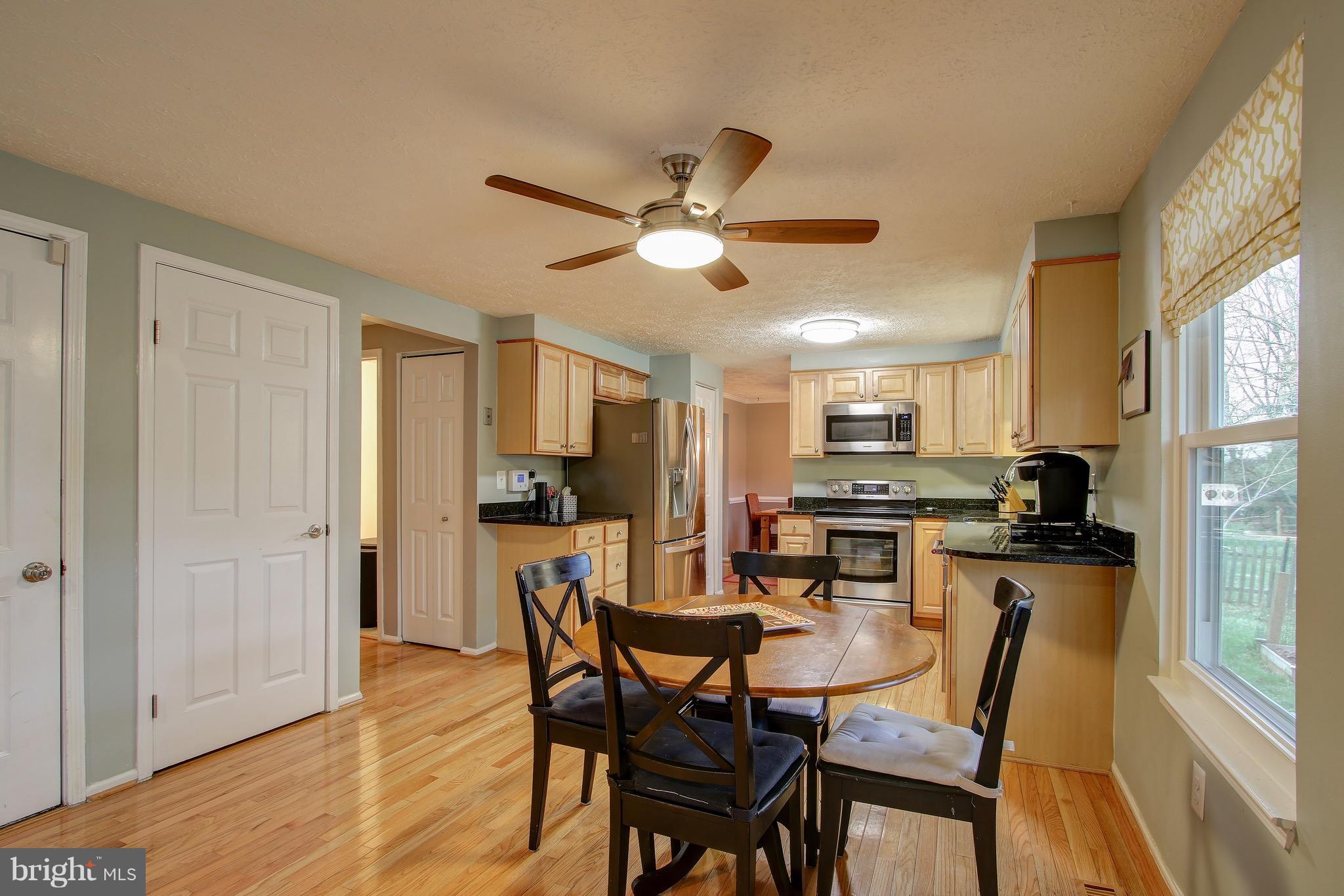 1113 Windmill Lane Silver Spring, MD 20905 - Photo 11 of 30 Open Kitchen with Maple Wood & Table Space