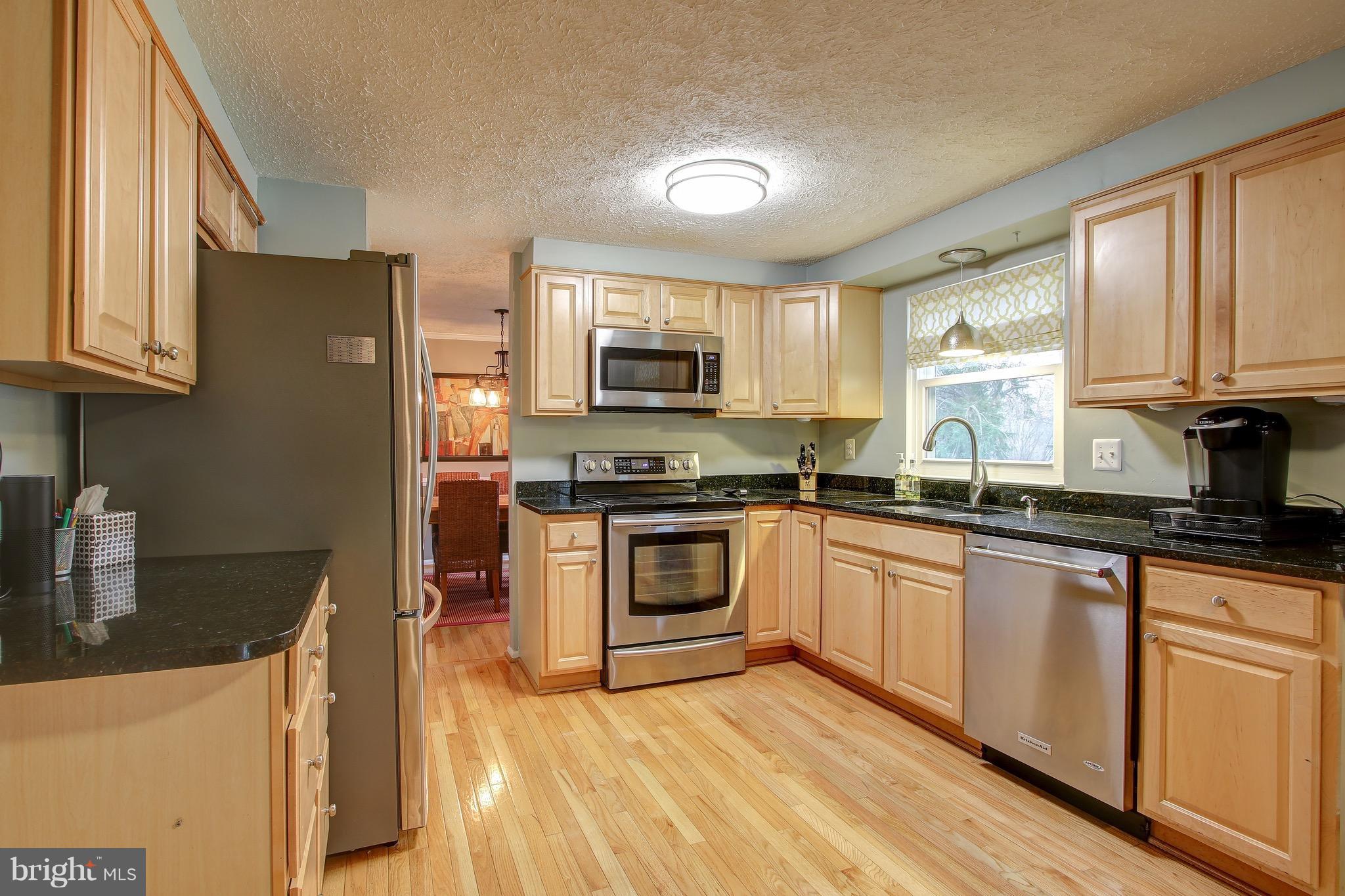 1113 Windmill Lane Silver Spring, MD 20905 - Photo 13 of 30 Sparkling Clean, Sun-Filled Kitchen