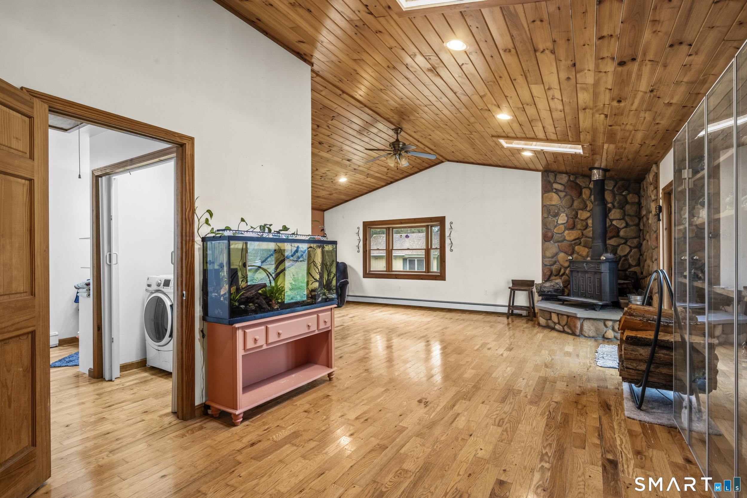 26 Field Street Stonington, CT 06379 - Photo 3 of 20 a view of a living room and bathroom